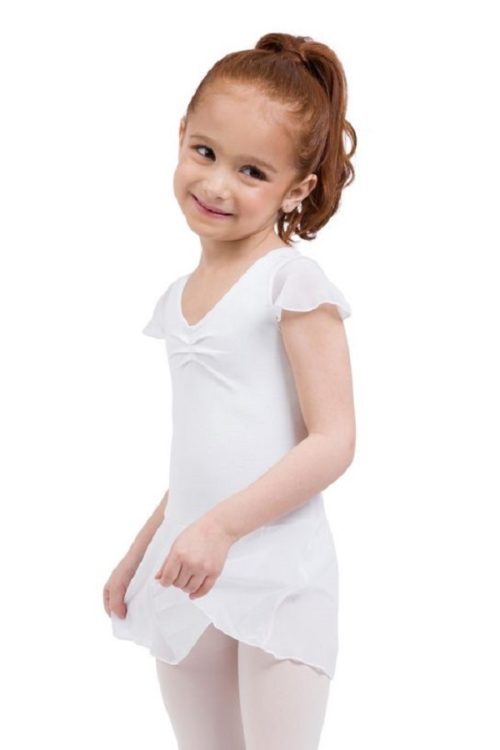 a pretty girl smiles in ballet clothes