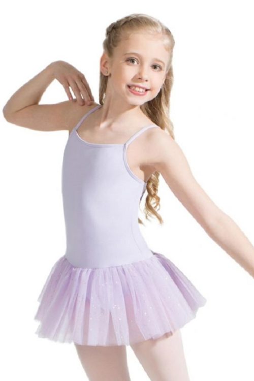 a pretty girl poses mid dance