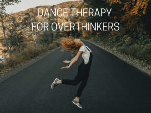 a woman dancing free on a quiet road - dance therapy for overthinkers