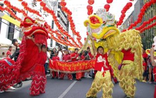 In Chinese culture the lion dance is performed in a bright lion costume and cape
