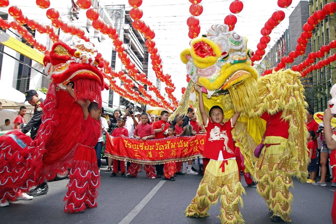 In Chinese culture the lion dance is performed in a bright lion costume and cape