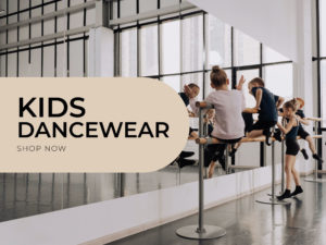 Kids Dancewear shop now in black text on the left in a rounded rectangle and on the right a group of kids climbing and playing on a ballet bar in front of tall mirrors