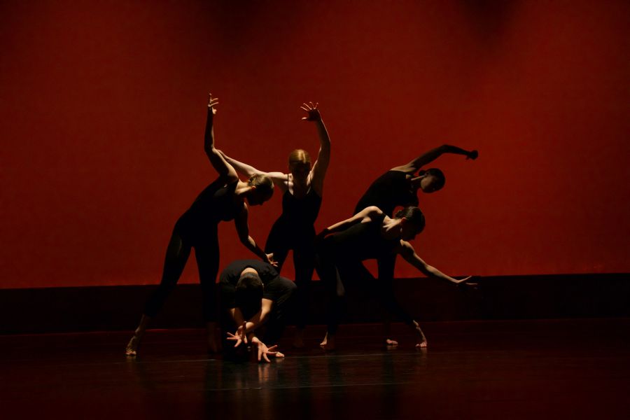 Contemporary dancers red background